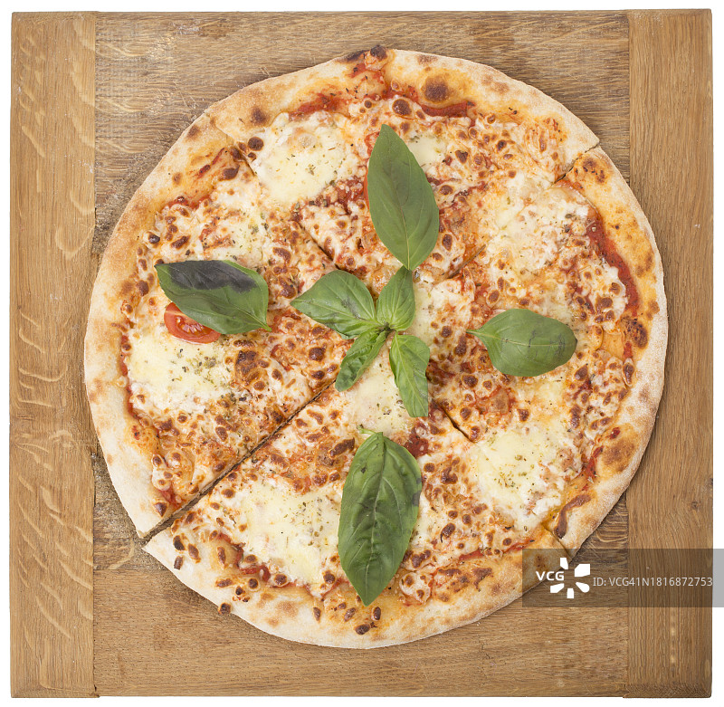 砧板上披萨的俯视图图片素材