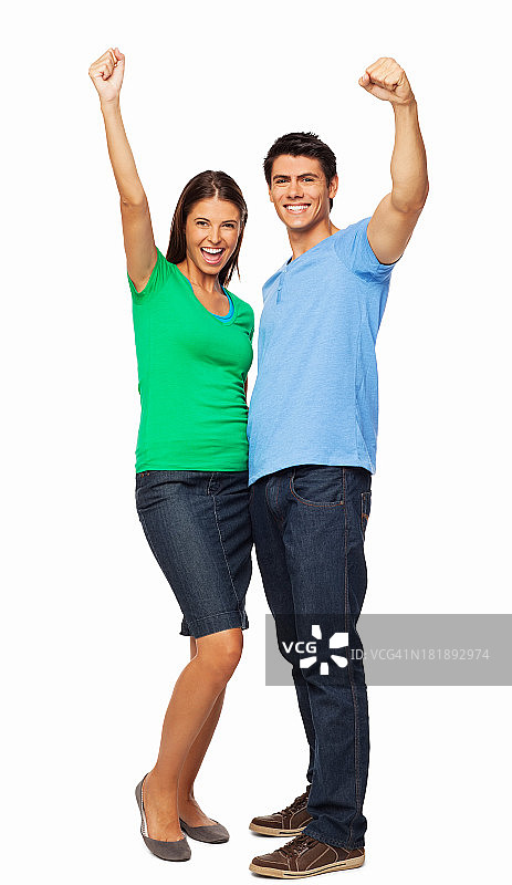 欢呼雀跃的兴奋的年轻夫妇 - 孤立图片素材