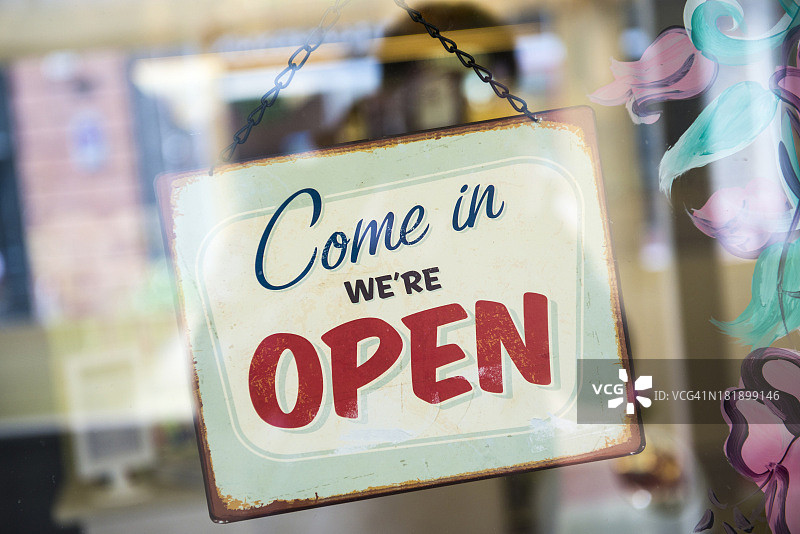 带有营业中标志的店铺开业图片素材