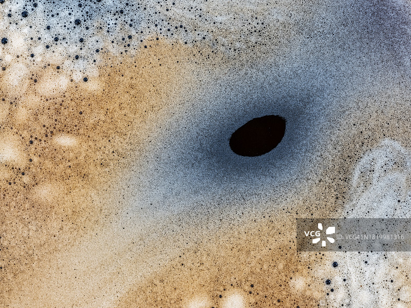 一杯新鲜冲泡咖啡的奶泡纹理图片素材