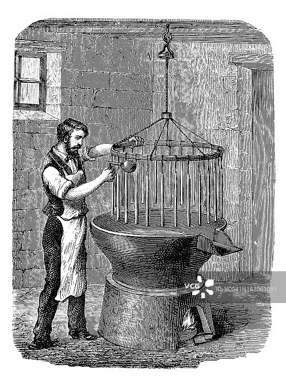 1870年男子制造蜡烛雕刻插图图片素材