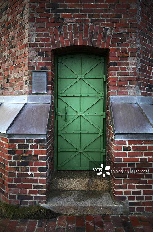 入口门、灯标、红崖灯塔、沙丘，德国叙尔特岛图片素材