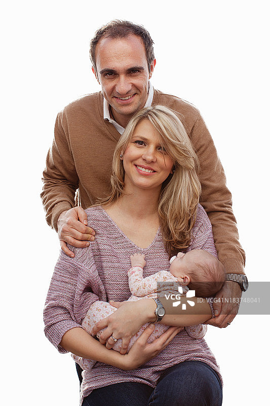 与新生女儿的夫妇图片素材
