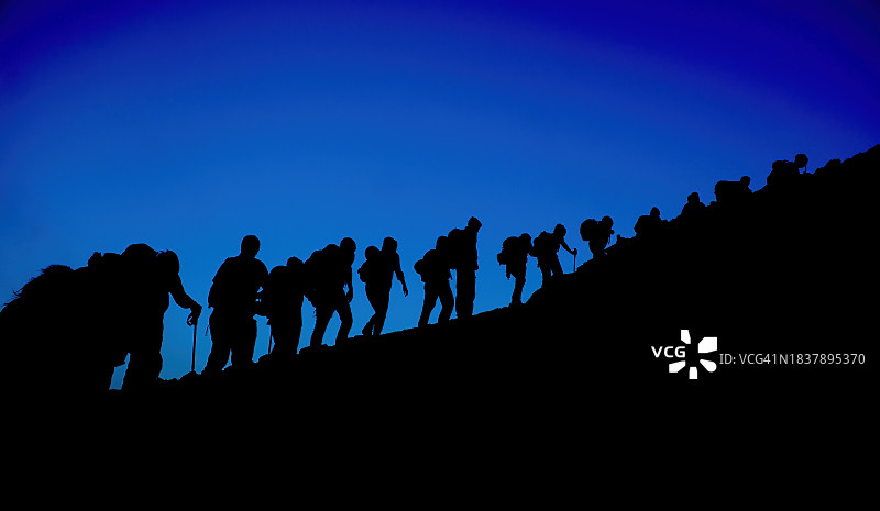 登山者的山峰图片素材