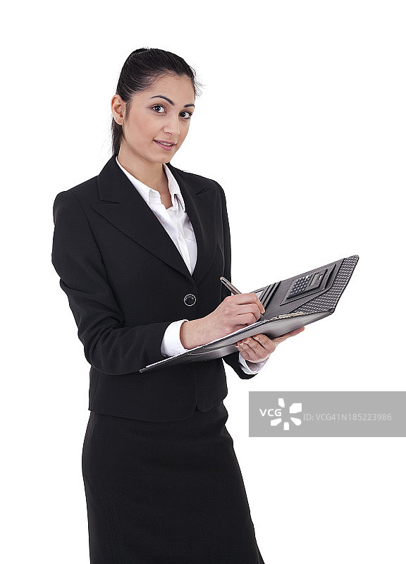 秘书在做笔记图片素材