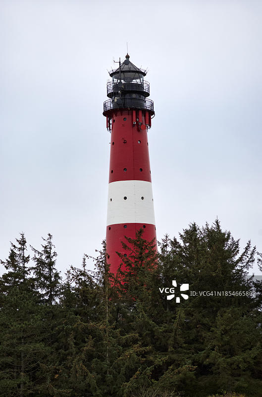 德国石勒苏益格-荷尔斯泰因叙尔特岛霍尔讷姆红白条纹灯塔图片素材