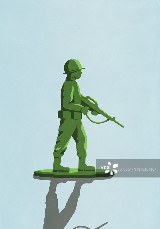 蓝色背景上手持步枪的绿色特种部队玩具士兵图片素材