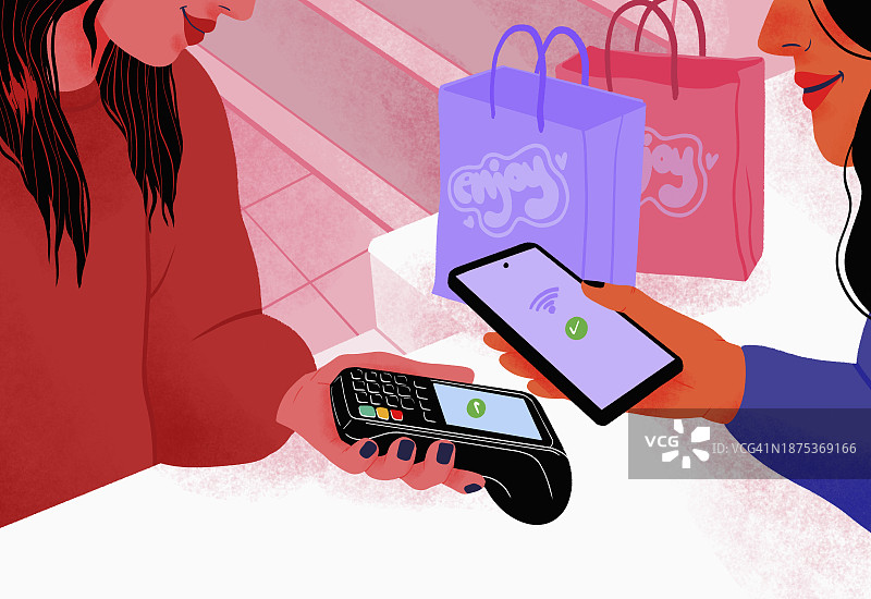 在零售店用智能手机进行非接触式支付的女人图片素材