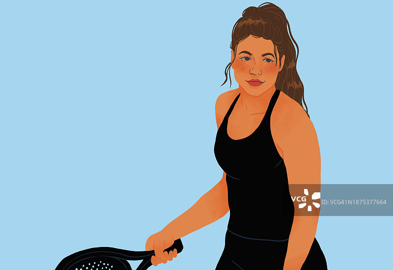 年轻女人在蓝色背景上打网球图片素材