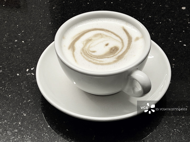 人脸图案卡布奇诺咖啡特写图片素材