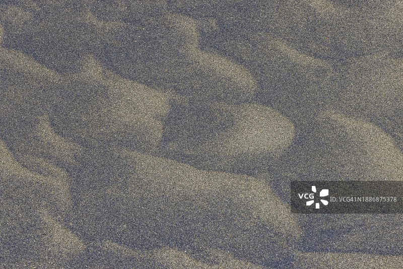 海滩沙子上的风蚀图案图片素材