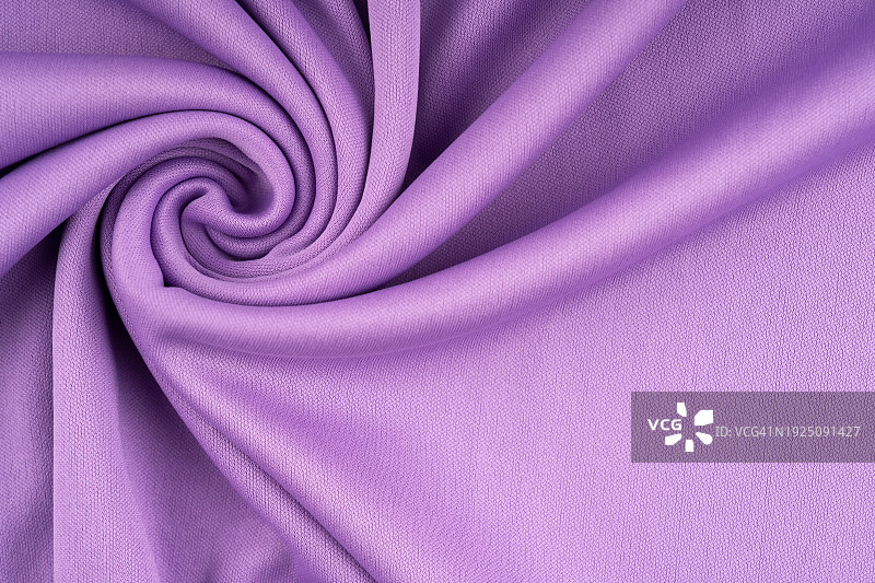 薰衣草紫色织物漩涡图案背景图片素材