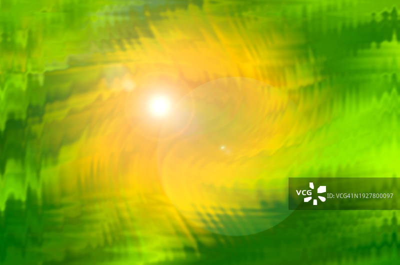 光晕下的绿黄色动态模糊抽象背景图片素材