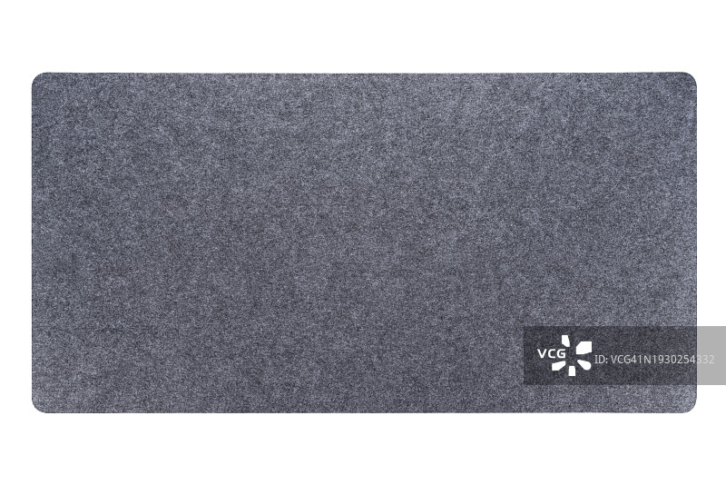 白色背景上的灰色羊毛毡桌垫图片素材