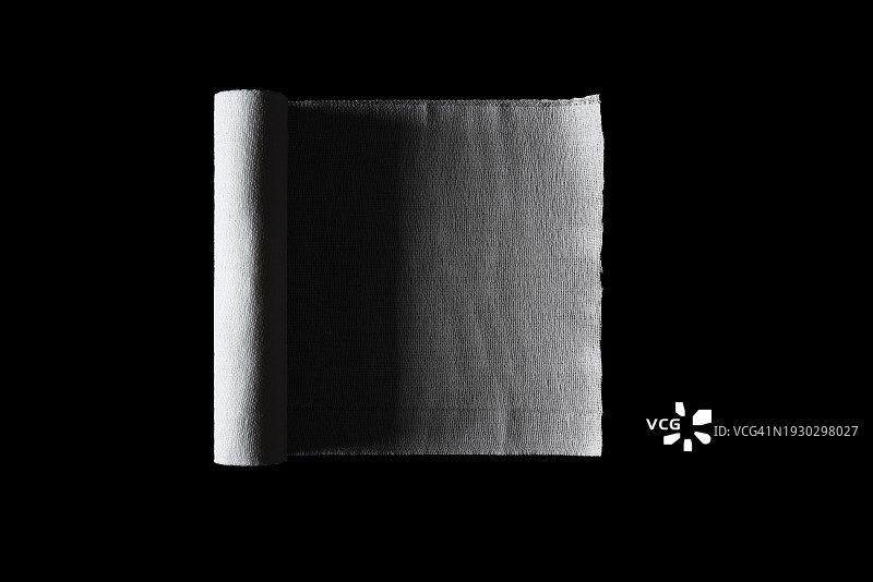 已打开的白色医用纱布卷图片素材