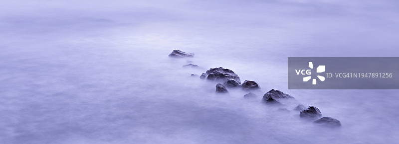 韩国济州岛龙头岩、龙渊及龙渊桥附近海滩长曝光摄影图片素材