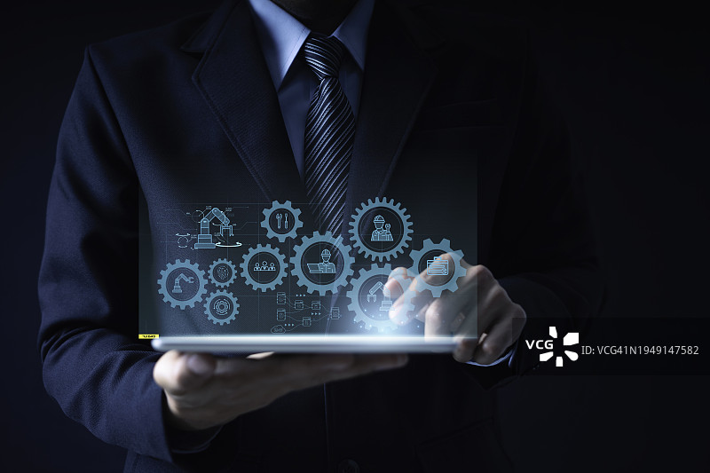 通过增强现实全息图进行3D模型分析，在未来自动化中控制机器人手臂的技术图片素材