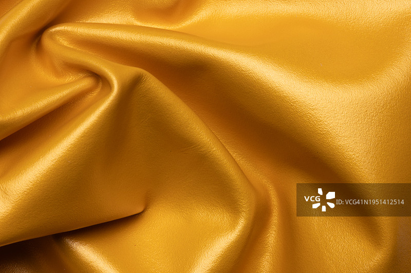 金色皮革背景纹理高分辨率全画幅拍摄图片素材