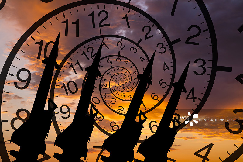 时钟背景上的导弹图片素材