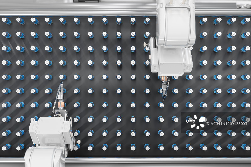 疫苗生产线上机器人手臂工作的高角度视图图片素材