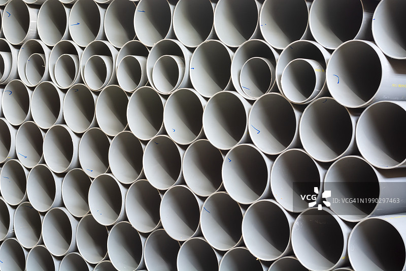 堆叠在一起的管道代表工业原材料商品行业和商业图片素材