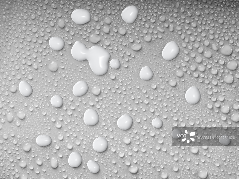 牛奶滴在表面滑落，带有小水滴图片素材