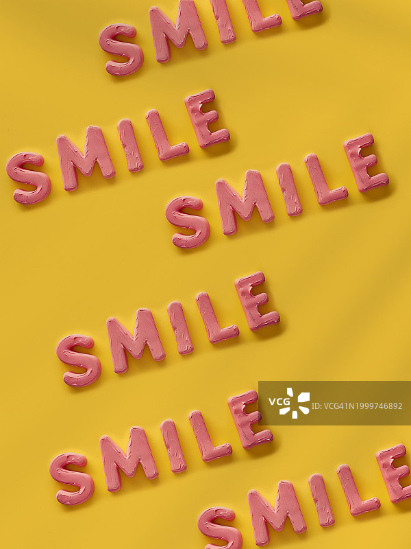3D字母无缝排列笑脸图片素材