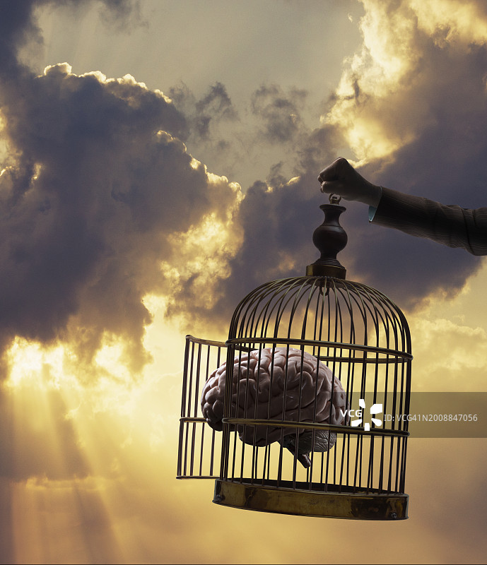 从笼子里释放的人脑图片素材