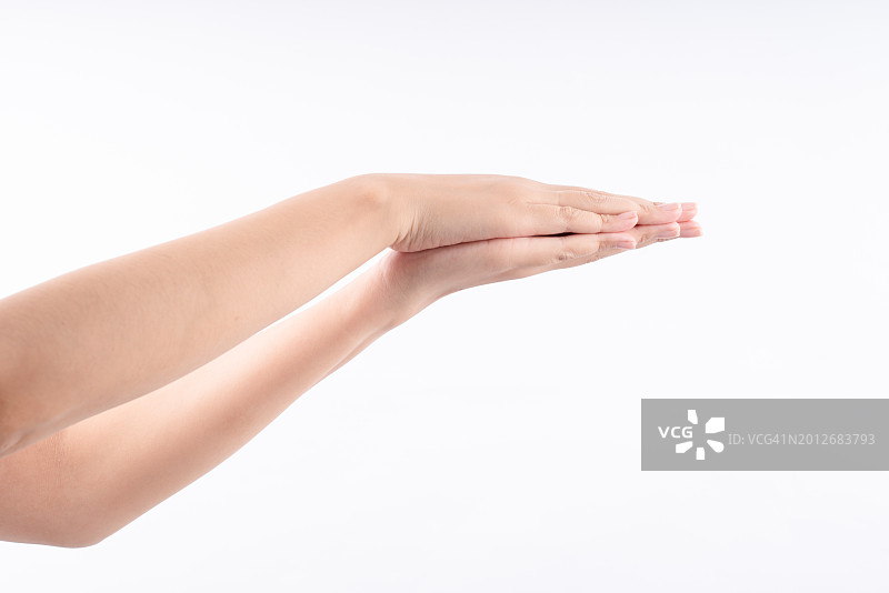 两只手掌合拢，隔离在白色背景上图片素材