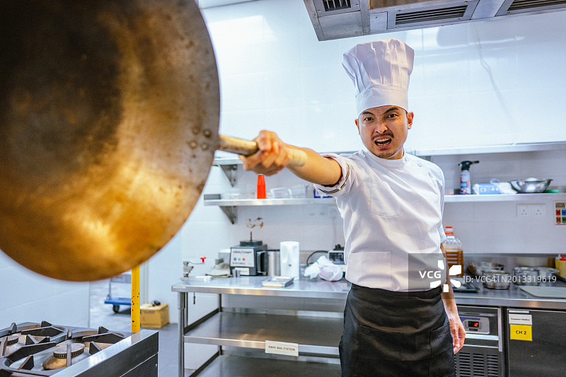 亚洲厨师学徒的奋斗精神图片素材