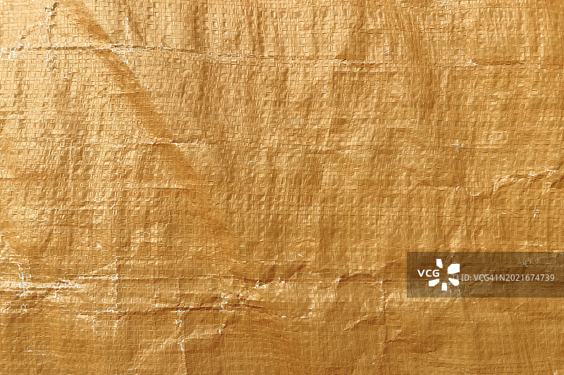 橙色聚丙烯塑料编织纺织品背景图片素材