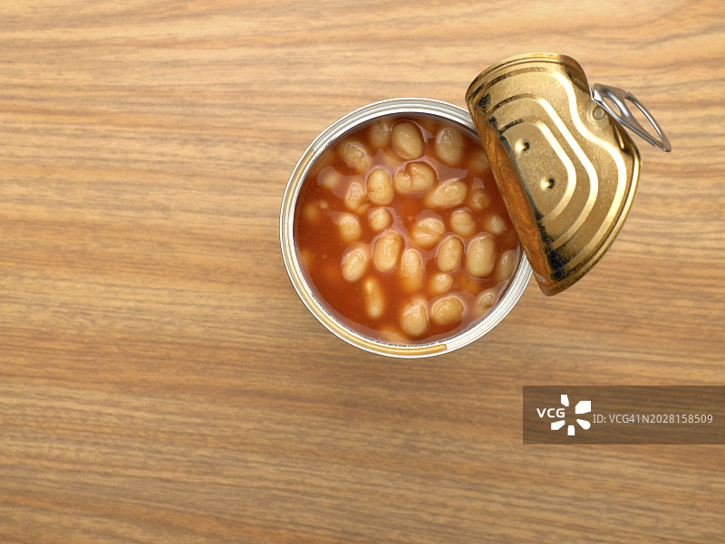 打开的烘焙豆罐头，木质背景图片素材
