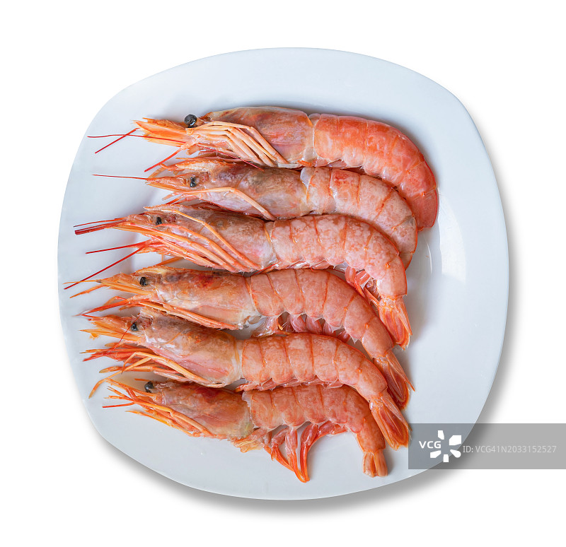 白色背景下盘中对虾的俯视图图片素材