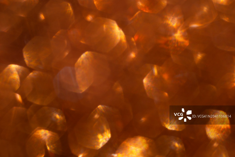 青铜色抽象散焦背景，适合文字叠加图片素材