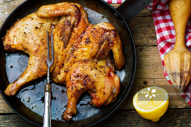 砖压烤鸡图片素材