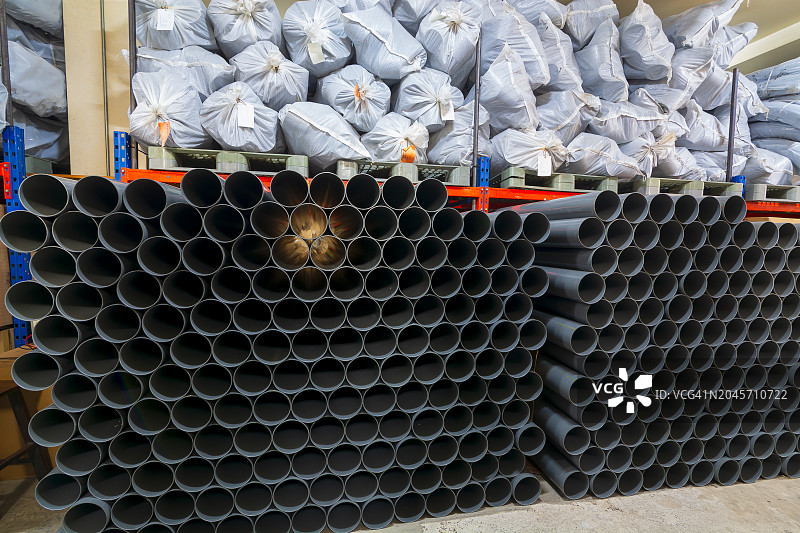 成排堆叠的灰色PVC塑料管图案图片素材