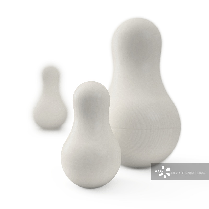 家庭组合中的三个木制堆叠娃娃玩具，一个成年人与另一个成年人和婴儿/儿童分开图片素材