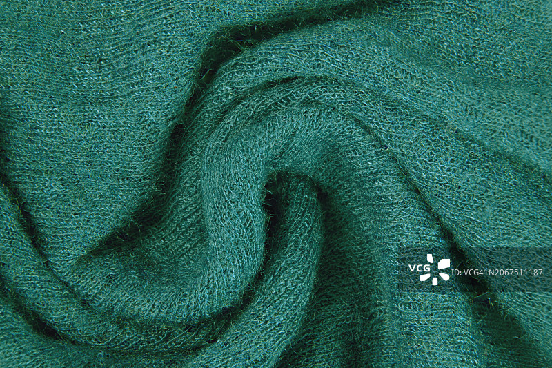 波浪纹理的绿色面料背景图片素材