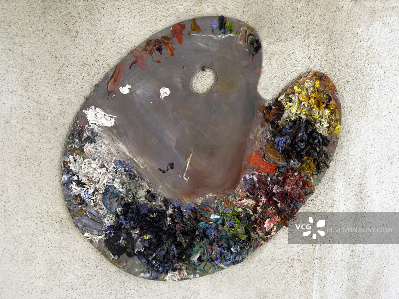 挂在墙上的混合颜料调色板图片素材