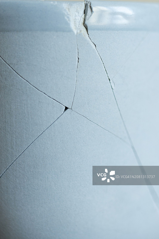 蓝色陶瓷裂纹表面特写图片素材