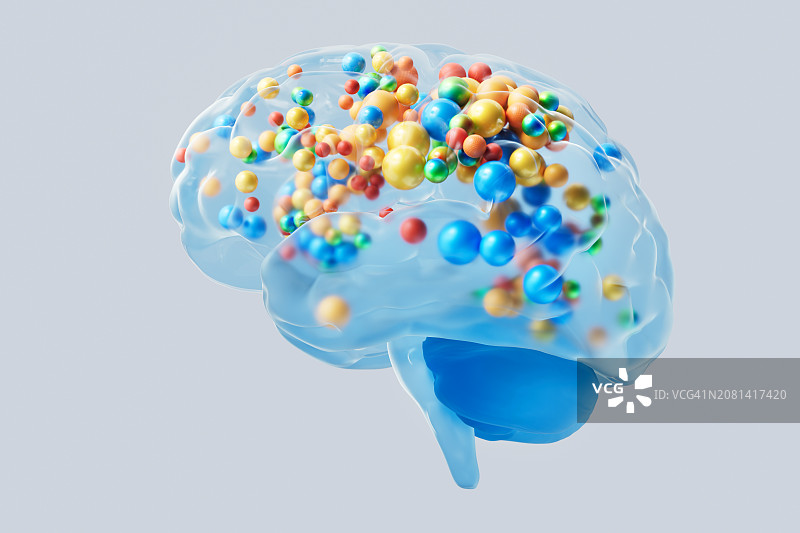 创造力的力量：充满彩色球体的人脑图片素材