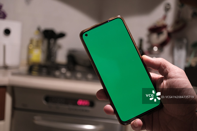 手持智能手机，色度键屏幕图片素材
