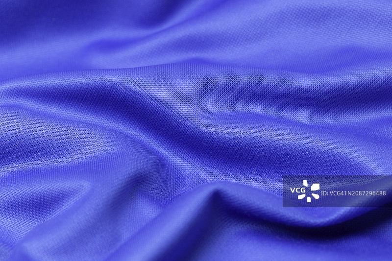 蓝色运动服面料足球衫球衣纹理和纺织背景图片素材