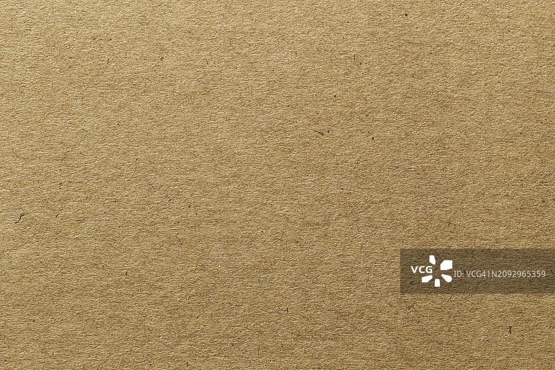 棕色生态再生牛皮纸片纹理纸板背景。图片素材