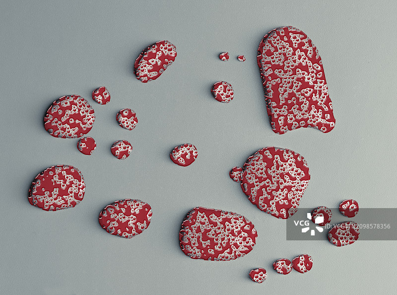 灰色背景上混合着水泡和红色液体的水滴图片素材