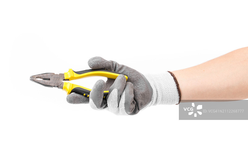 裁剪的手在白色背景前拿着钳子图片素材
