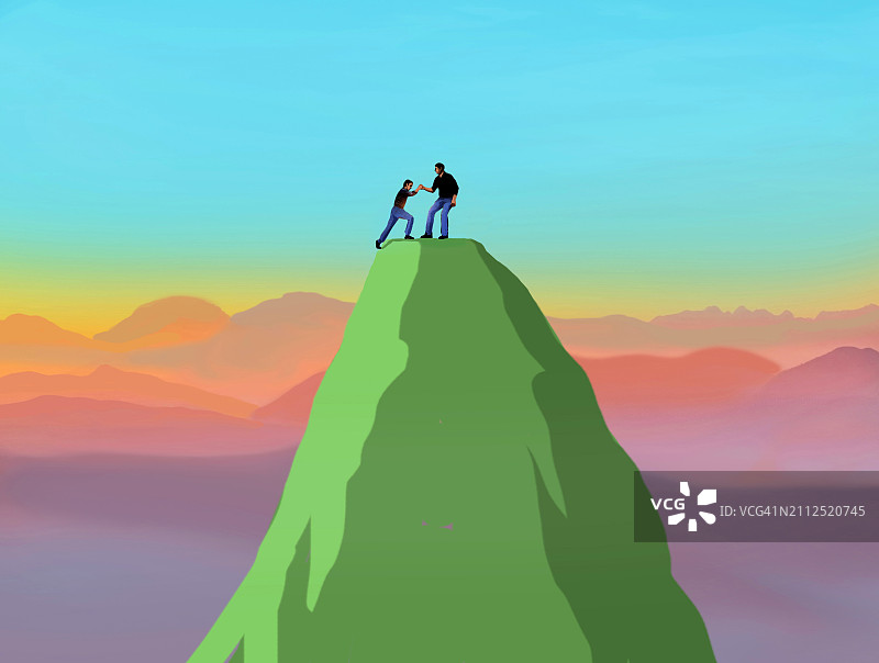 男人帮助另一个人登上山顶图片素材