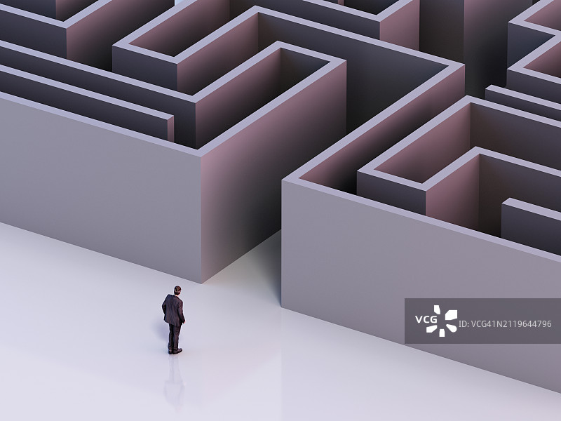站在复杂迷宫前的商人，思考下一步图片素材