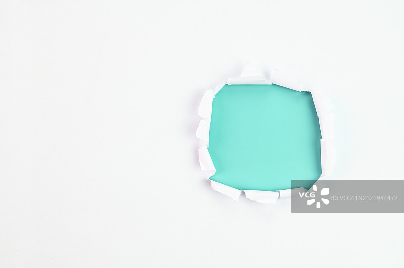 绿松石色撕裂纸张图片素材