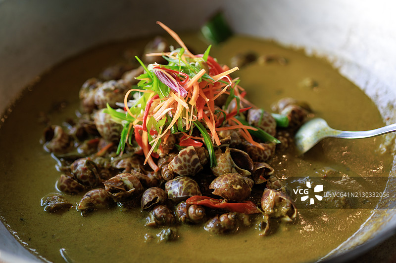香料咖喱酱烹制 Gastropod 特写，传统马来西亚美食图片素材